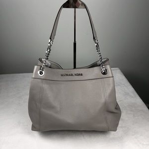 Michael Kors light gray purse with shoulder handles
